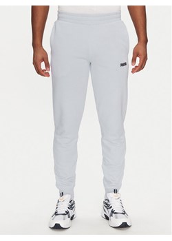 Puma Spodnie dresowe Ess 684714 Błękitny Regular Fit ze sklepu MODIVO w kategorii Spodnie męskie - zdjęcie 182765589