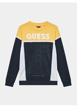 Guess Bluza N3BQ02 KAX73 Granatowy Regular Fit ze sklepu MODIVO w kategorii Bluzy chłopięce - zdjęcie 182767328