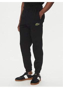 Lacoste Spodnie dresowe XH2750 Czarny Regular Fit ze sklepu MODIVO w kategorii Spodnie męskie - zdjęcie 183558589