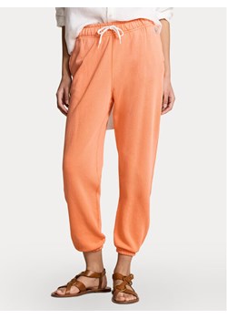 Polo Ralph Lauren Spodnie dresowe 211935585001 Pomarańczowy Regular Fit ze sklepu MODIVO w kategorii Spodnie damskie - zdjęcie 183578375