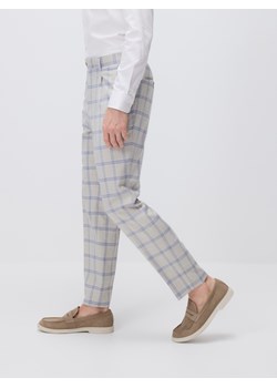Reserved - Garniturowe spodnie slim fit - beżowy ze sklepu Reserved w kategorii Spodnie męskie - zdjęcie 183582287