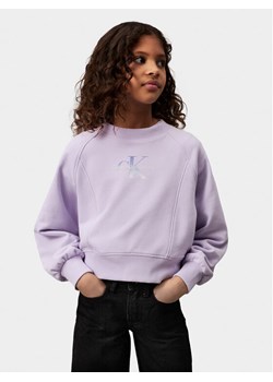 Calvin Klein Jeans Bluza Gradient Monogram IG0IG02539 Fioletowy Regular Fit ze sklepu MODIVO w kategorii Bluzy dziewczęce - zdjęcie 183582895