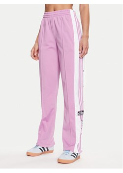 adidas Spodnie dresowe Adibreak IY2129 Fioletowy Loose Fit ze sklepu MODIVO w kategorii Spodnie damskie - zdjęcie 183593355