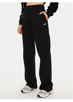 Fila Spodnie dresowe Lauka FAW0910 Czarny Wide Leg - id: 0000304654718 - marki Fila - 183612457 Fila Spodnie dresowe Lauka FAW0910 Czarny Wide Leg ze sklepu MODIVO w kategorii Spodnie damskie - zdjęcie 183612457