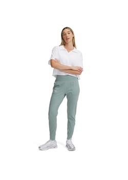 Damskie spodnie treningowe Under Armour Motion Jogger - zielone ze sklepu Sportstylestory.com w kategorii Spodnie damskie - zdjęcie 183628866