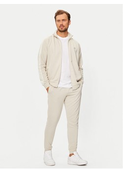 adidas Dres Basic 3-Stripes French Terry IY6653 Beżowy Regular Fit ze sklepu MODIVO w kategorii Dresy męskie - zdjęcie 183631475