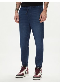 Jack&Jones Joggery Gordon 12249152 Granatowy Tapered Fit ze sklepu MODIVO w kategorii Spodnie męskie - zdjęcie 183631586