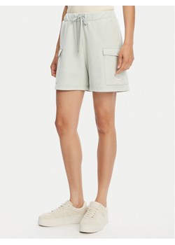 Champion Szorty sportowe 118024 Zielony Standard Fit ze sklepu MODIVO w kategorii Szorty - zdjęcie 183631666