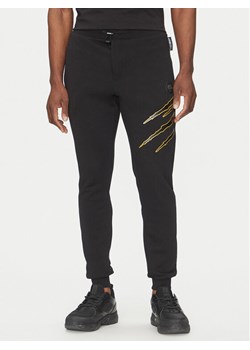 Plein Sport Spodnie dresowe SAEC MJT2490 STE001N Czarny Loose Fit - id: 0000305123350 - marki Plein Sport - 183635028 Plein Sport Spodnie dresowe SAEC MJT2490 STE001N Czarny Loose Fit ze sklepu MODIVO w kategorii Spodnie męskie - zdjęcie 183635028