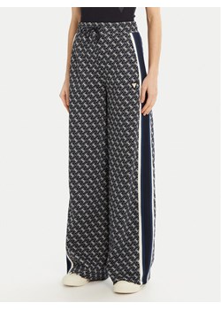 Guess Spodnie dresowe V5RB03 KCO90 Czarny Palazzo Fit ze sklepu MODIVO w kategorii Spodnie damskie - zdjęcie 183639508