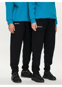 Pangaia Spodnie dresowe Archive Recycled Cotton Czarny Regular Fit ze sklepu MODIVO w kategorii Spodnie męskie - zdjęcie 183652256