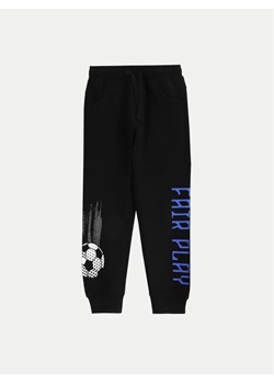 Coccodrillo Spodnie dresowe WC5120103MBK Czarny Slim Fit ze sklepu MODIVO w kategorii Spodnie chłopięce - zdjęcie 183652537