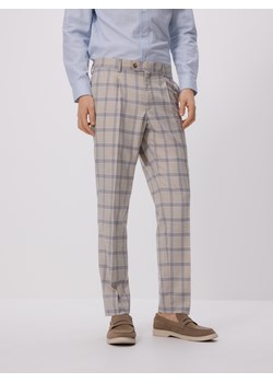 Reserved - Garniturowe spodnie slim fit - beżowy ze sklepu Reserved w kategorii Spodnie męskie - zdjęcie 183667319