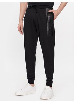 Boss Spodnie dresowe Authentic 50510628 Czarny Regular Fit ze sklepu MODIVO w kategorii Spodnie męskie - zdjęcie 183689099
