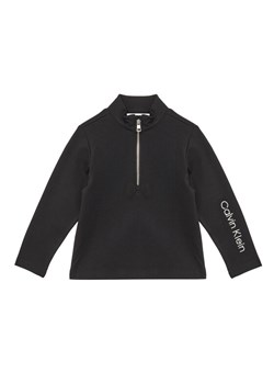 Calvin Klein Jeans Bluzka IG0IG02978 M Czarny Regular Fit ze sklepu MODIVO w kategorii T-shirty chłopięce - zdjęcie 183706245