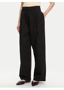 Tommy Hilfiger Spodnie materiałowe WW0WW45780 Czarny Wide Leg ze sklepu MODIVO w kategorii Spodnie damskie - zdjęcie 183706488