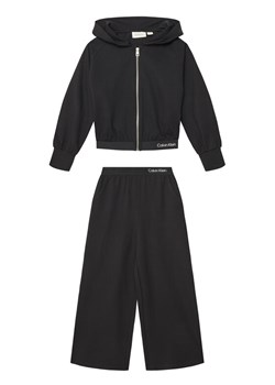 Calvin Klein Jeans Dres Logo Tape IG0IG02817 D Czarny Regular Fit ze sklepu MODIVO w kategorii Dresy chłopięce - zdjęcie 183706669