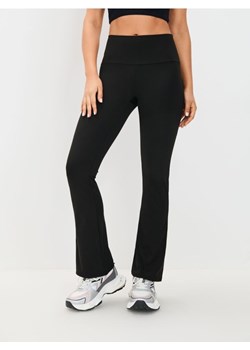 Sinsay - Legginsy flare GYM HARD - czarny ze sklepu Sinsay w kategorii Spodnie damskie - zdjęcie 183720969