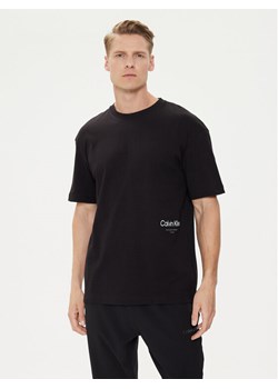Calvin Klein T-Shirt Off Placement K10K113102 Czarny Regular Fit ze sklepu MODIVO w kategorii T-shirty męskie - zdjęcie 183725349