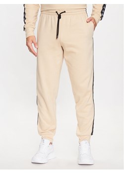 Kappa Spodnie dresowe 313014 Beżowy Regular Fit ze sklepu MODIVO w kategorii Spodnie męskie - zdjęcie 183725595