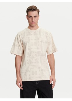 Karl Kani T-Shirt Small Signature Paisley PD00005342 Beżowy Relaxed Fit ze sklepu MODIVO w kategorii T-shirty męskie - zdjęcie 183737259