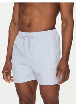 Calvin Klein Swimwear Szorty kąpielowe KM0KM01166 Niebieski Regular Fit ze sklepu MODIVO w kategorii Kąpielówki - zdjęcie 183737286