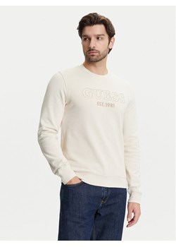 Guess Bluza M5YQ08 KCN01 Beżowy Regular Fit ze sklepu MODIVO w kategorii Bluzy męskie - zdjęcie 183813235