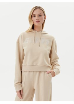 Guess Bluza V5GQ09 KCRP0 Beżowy Relaxed Fit ze sklepu MODIVO w kategorii Bluzy damskie - zdjęcie 183813316