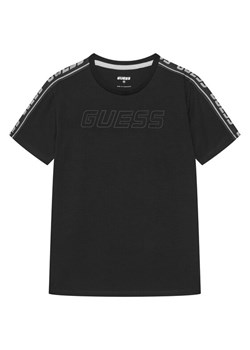 Guess T-Shirt L4YI50 J1314 Czarny Regular Fit ze sklepu MODIVO w kategorii T-shirty chłopięce - zdjęcie 183813778