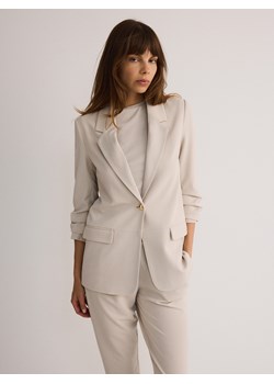 Reserved - Marynarka z marszczonymi rękawami - beżowy - id: 1616I-08X - marki Reserved - 183826467 Reserved - Marynarka z marszczonymi rękawami - beżowy ze sklepu Reserved w kategorii Marynarki damskie - zdjęcie 183826467