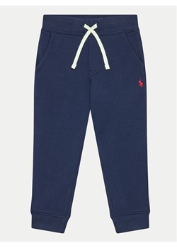 Polo Ralph Lauren Spodnie dresowe Core Replen 321720897003 Granatowy Regular Fit ze sklepu MODIVO w kategorii Spodnie chłopięce - zdjęcie 183833075