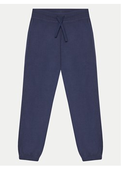 United Colors Of Benetton Spodnie dresowe 3EB5CF05L Granatowy Regular Fit ze sklepu MODIVO w kategorii Spodnie chłopięce - zdjęcie 183842049