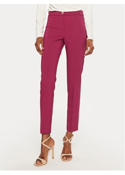 Rinascimento Spodnie materiałowe CFC0119993003 Różowy Slim Fit ze sklepu MODIVO w kategorii Spodnie damskie - zdjęcie 183862839
