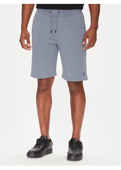 Guess Szorty sportowe Z2YD04 KAIJ1 Niebieski Regular Fit ze sklepu MODIVO w kategorii Spodenki męskie - zdjęcie 183862977