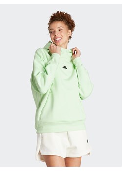 adidas Bluza Z.N.E. IS3905 Zielony Loose Fit ze sklepu MODIVO w kategorii Bluzy damskie - zdjęcie 183885647