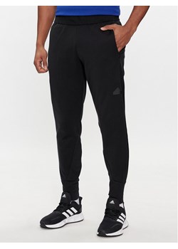 adidas Spodnie dresowe Z.N.E. Winterized IN1899 Czarny Regular Fit ze sklepu MODIVO w kategorii Spodnie męskie - zdjęcie 183885678