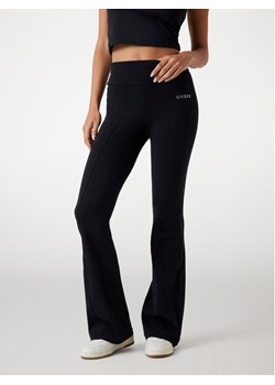 Guess Spodnie materiałowe 175791 Czarny Slim Fit ze sklepu MODIVO w kategorii Spodnie damskie - zdjęcie 183888089