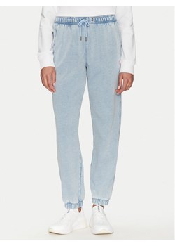 Guess Jeans Spodnie dresowe W5GB32 KCTJ1 Niebieski Regular Fit ze sklepu MODIVO w kategorii Spodnie damskie - zdjęcie 183890055