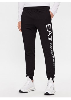 EA7 Emporio Armani Spodnie dresowe 7M000571 AF13512 MC001 Czarny Regular Fit ze sklepu MODIVO w kategorii Spodnie męskie - zdjęcie 183938077