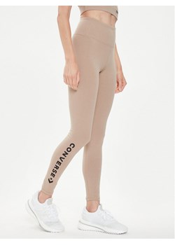Converse Legginsy W Wordmark Legging 10024544-A10 Beżowy Skinny Fit ze sklepu MODIVO w kategorii Spodnie damskie - zdjęcie 183945218