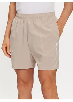 adidas Szorty sportowe Terrex Multi HZ6308 Beżowy Regular Fit ze sklepu MODIVO w kategorii Spodenki męskie - zdjęcie 183945525