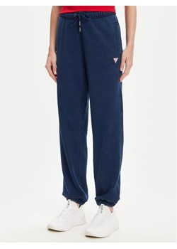 Guess Spodnie dresowe W5YB65 KCXQ1 Granatowy Regular Fit ze sklepu MODIVO w kategorii Spodnie damskie - zdjęcie 183945888