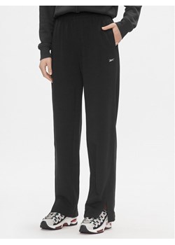 Reebok Spodnie dresowe Classics IL4647 Czarny Relaxed Fit ze sklepu MODIVO w kategorii Spodnie damskie - zdjęcie 183946699