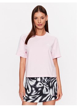 adidas T-Shirt Essentials 3-Stripes Single Jersey Crop Top IC0760 Różowy Loose Fit ze sklepu MODIVO w kategorii Bluzki damskie - zdjęcie 183946985