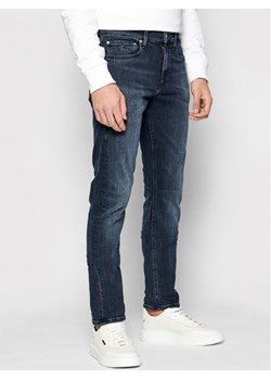 Calvin Klein Jeans Jeansy J30J317663 Granatowy Slim Fit ze sklepu MODIVO w kategorii Jeansy męskie - zdjęcie 183947968