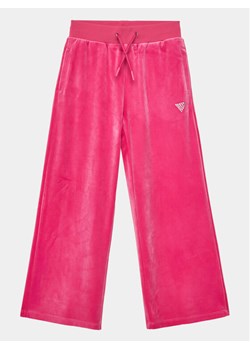 Guess Spodnie dresowe J4RQ16 KBXI2 Różowy Wide Leg ze sklepu MODIVO w kategorii Spodnie dziewczęce - zdjęcie 183948577