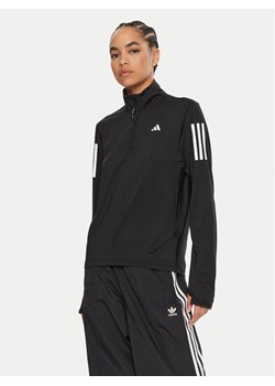 adidas Bluza techniczna Own the Run IK7440 Czarny Regular Fit ze sklepu MODIVO w kategorii Bluzy damskie - zdjęcie 183948665