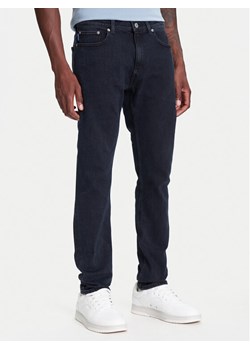 HUGO Jeansy Zane 50541548 Granatowy Extra Slim Fit ze sklepu MODIVO w kategorii Jeansy męskie - zdjęcie 183948967