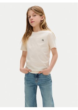 Calvin Klein Jeans Komplet 2 t-shirtów Monologo IB0IB01093 D Beżowy Regular Fit ze sklepu MODIVO w kategorii Bluzki dziewczęce - zdjęcie 183985116