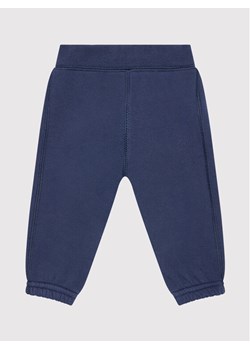 United Colors Of Benetton Spodnie dresowe 3J70MF238 Granatowy Regular Fit - id: 0000208740944 - marki United Colors Of Benetton - 183985455 United Colors Of Benetton Spodnie dresowe 3J70MF238 Granatowy Regular Fit ze sklepu MODIVO w kategorii Odzież dla niemowląt - zdjęcie 183985455